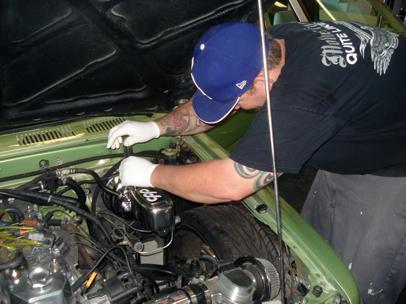 05-18-08 Toyota (26) Brad checking fluid levels